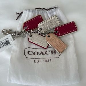 Coach bag charm- brand new. Includes Coach charm bag.